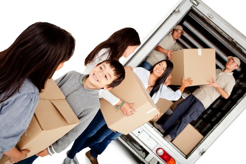 Removal team planning a move in Putney street