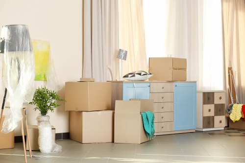 Team loading a van safely during a moving job