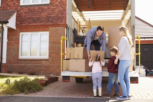 Professional piano removals in Putney with careful wrapping and lifting