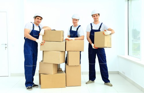 Boxes and furniture being unloaded during a Putney move