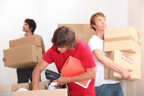 Office furniture and equipment prepared for a Putney business move