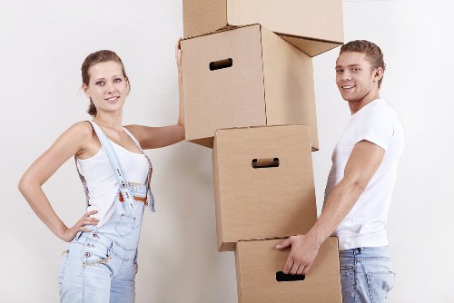 Packed boxes and furniture loaded into a removal truck